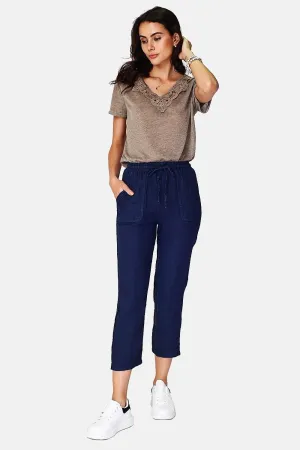 Wide pants, high waist, patch pockets with lacy